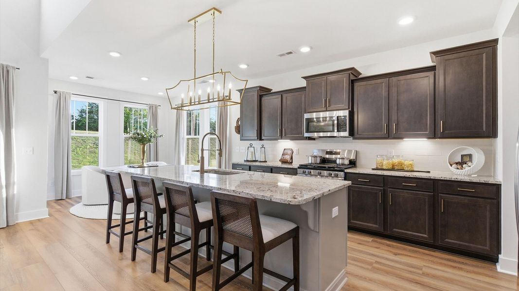 Furnished interior in a model home at Benjamin's Grove in Woodruff (Image 24).