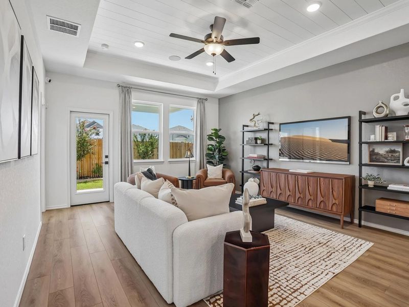 Furnished interior in a model home at Fairway Crossing in Converse (Image 5).