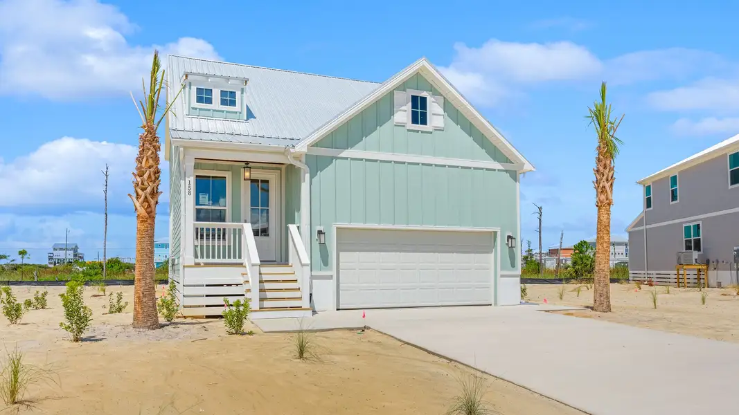 Front exterior of a home in the Redfish Cove at Cape San Blas community, located in Port Saint Joe, FL (Image 2).