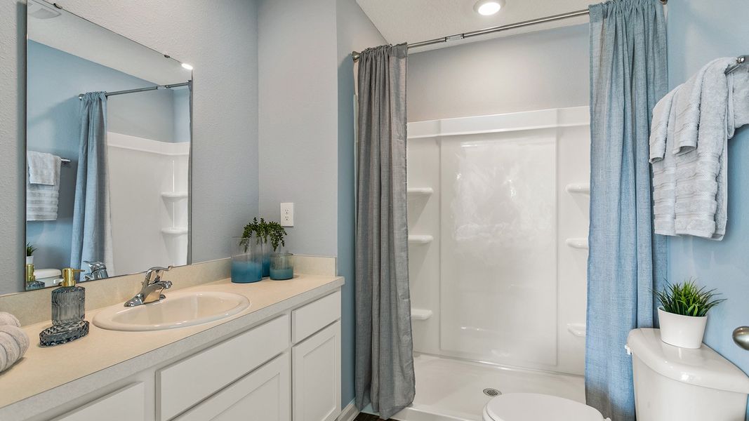 Furnished interior in a model home at Stokes Landing Express in St. Augustine (Image 16).