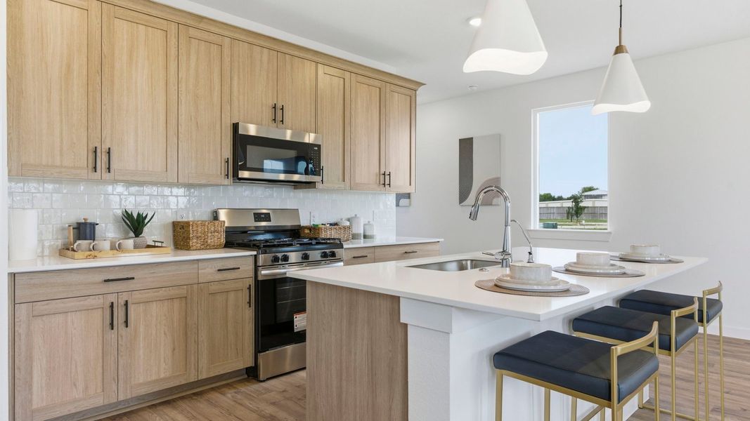 Furnished interior in a model home at Murphy Village in Missouri City (Image 5).