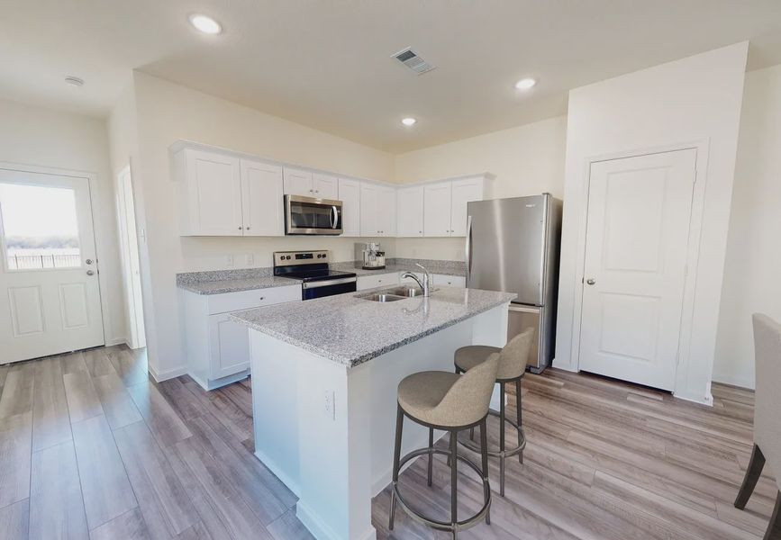 Furnished interior in a model home at Sonterra in Jarrell (Image 5).