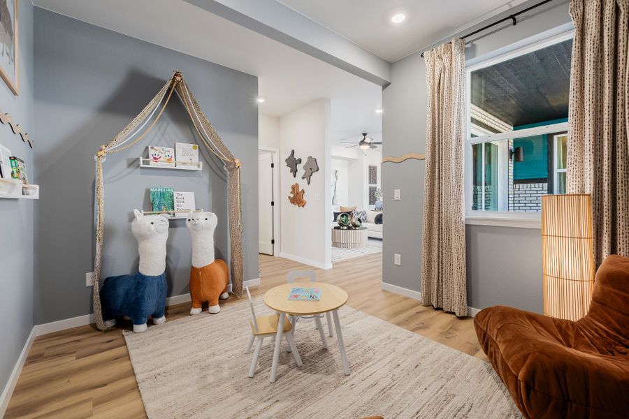 Furnished interior in a model home at Painted Prairie in Aurora (Image 70).