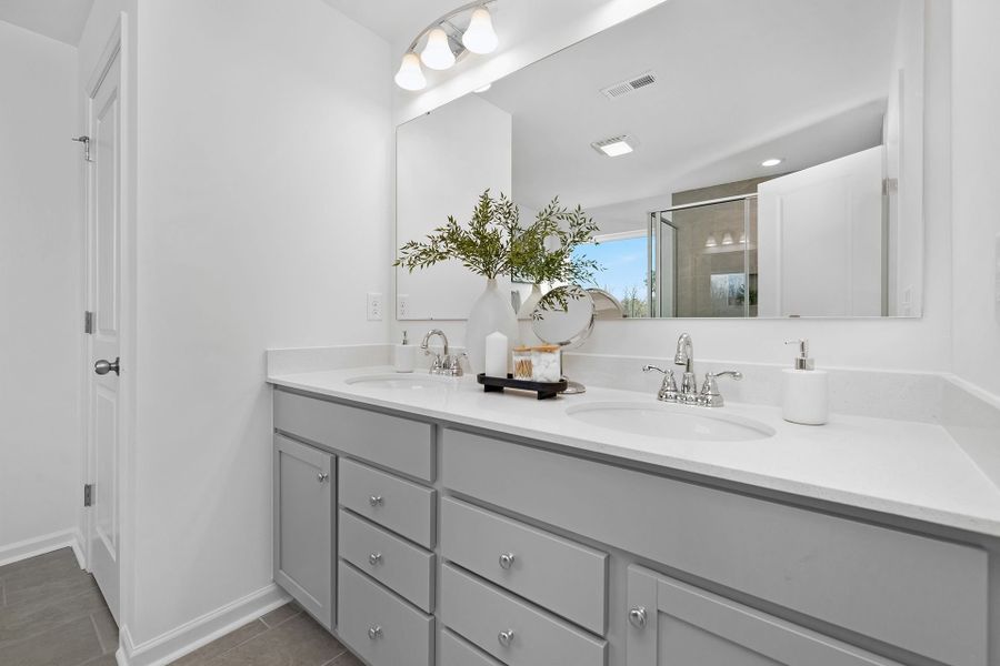 Furnished interior in a model home at Whispering Hills in Locust (Image 13).