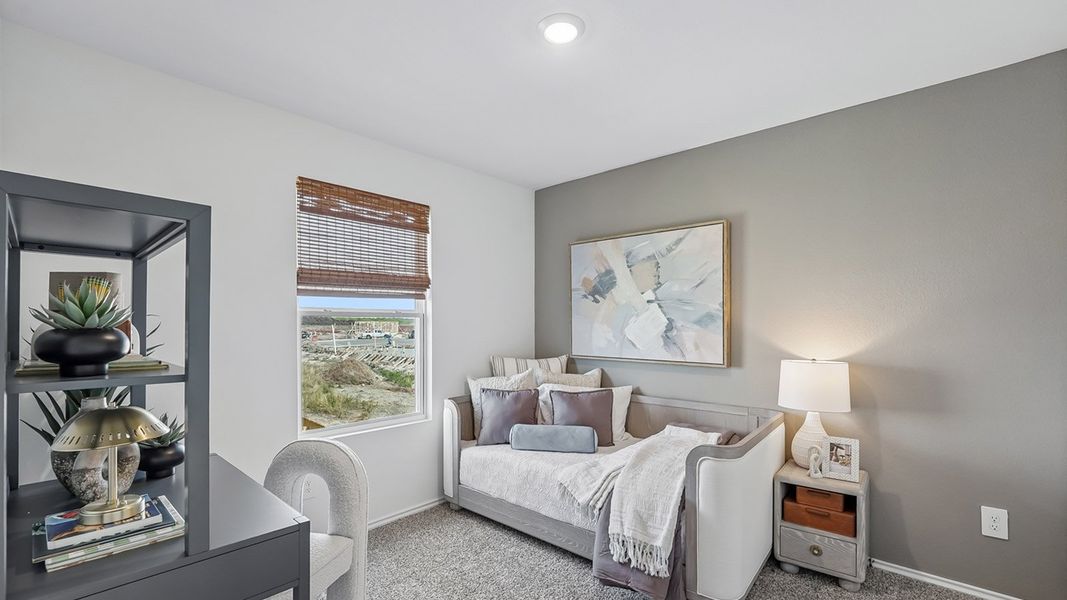 Furnished interior in a model home at Marigold in Kyle (Image 31).