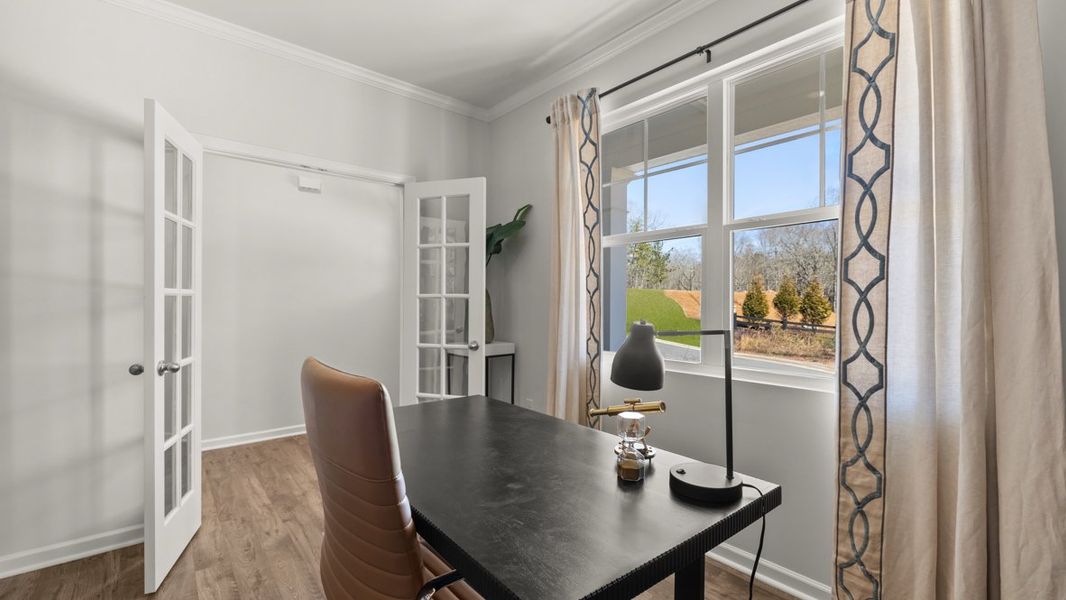 Furnished interior in a model home at Falcon Landing in Gainesville (Image 8).