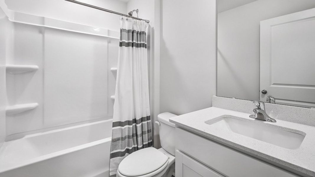 Furnished interior in a model home at The Townes at Honeycutt Oaks in Angier (Image 33).