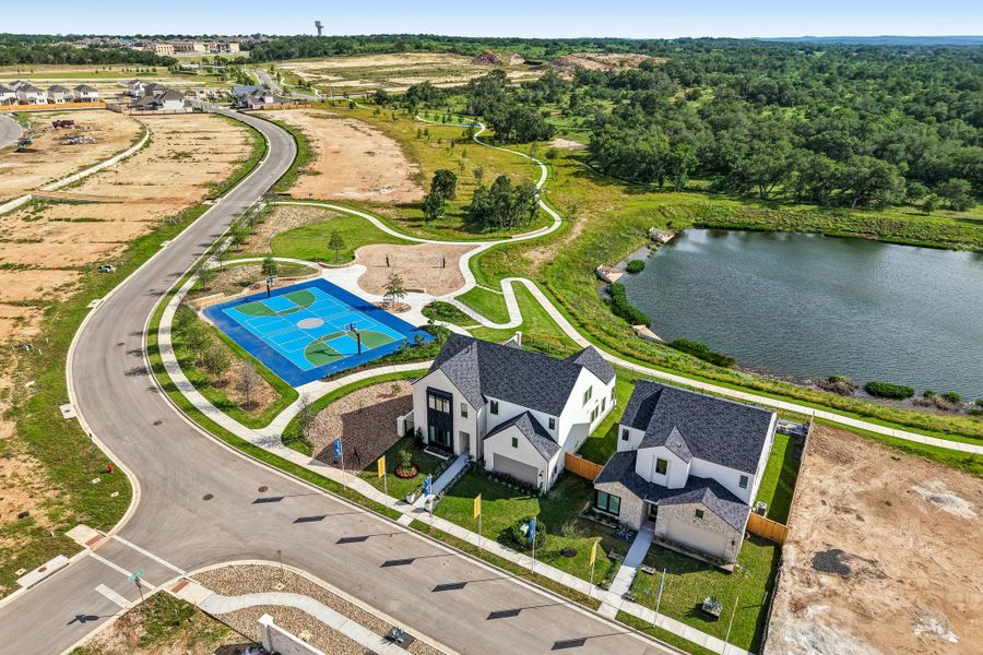 Aerial view of the Freedom at Anthem community in Kyle, TX, showing layout and nearby surroundings (Image 11). Aerial view of the Freedom at Anthem community in Kyle, TX, showing layout and nearby surroundings (Image 11).