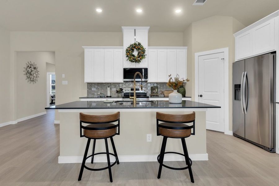 Furnished interior in a model home at Freeman Farm in Kaufman (Image 6).