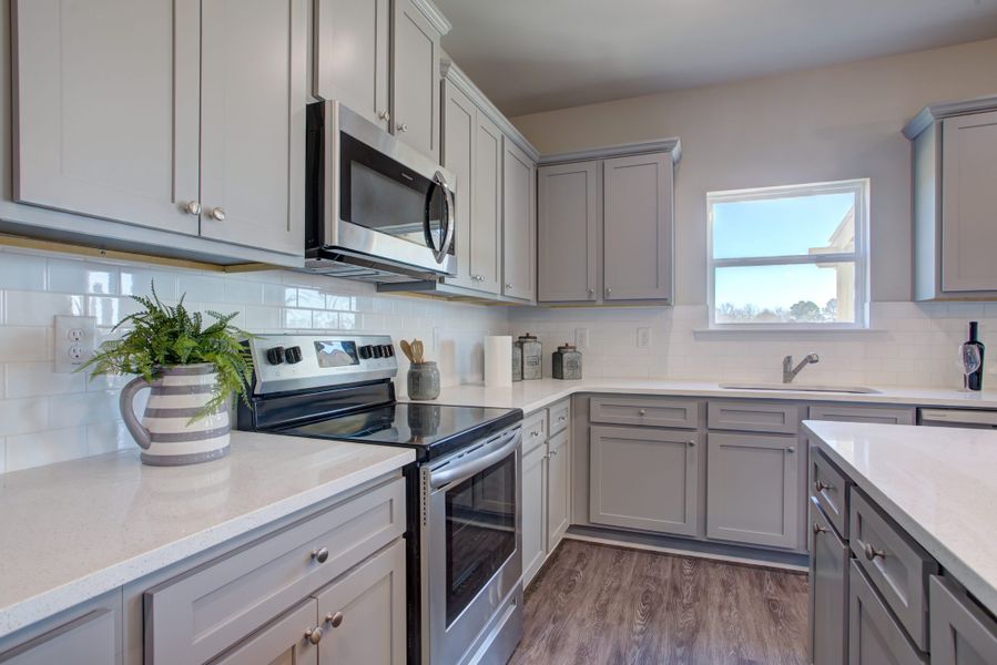 Furnished interior in a model home at Legends at Old Monroe in Monroe (Image 25).