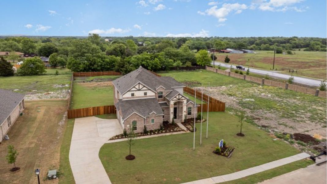 Front exterior of a home in the Crystal Lake Estates community, located in Red Oak, TX (Image 12). Front exterior of a home in the Crystal Lake Estates community, located in Red Oak, TX (Image 12).