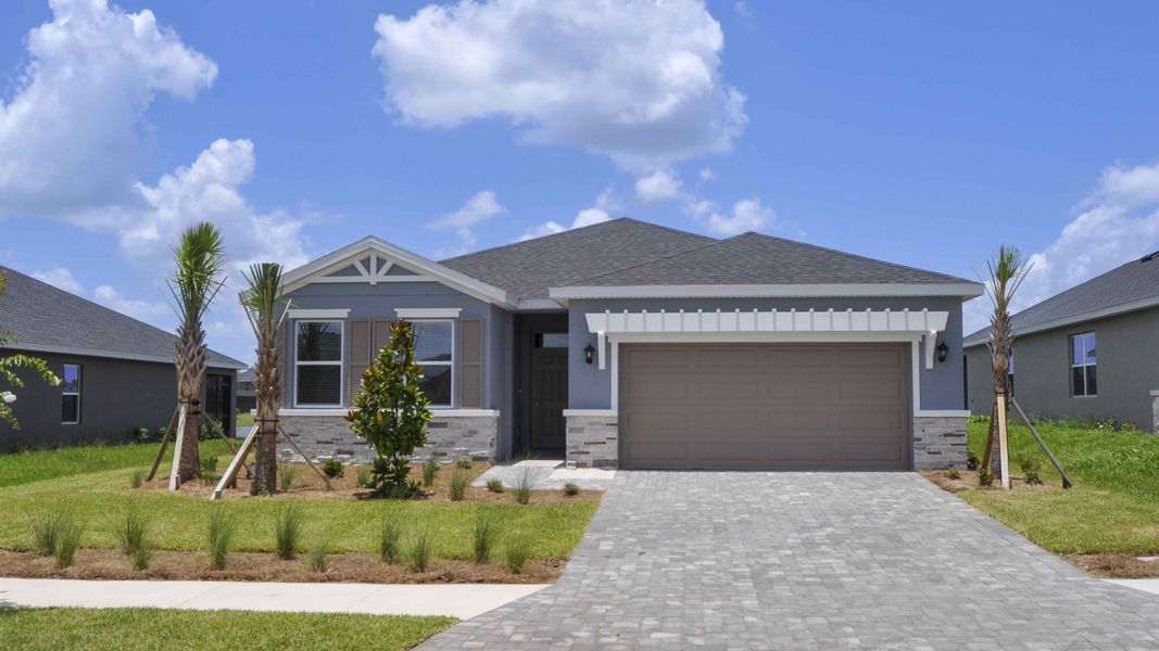Front exterior of a home in the Legacy Preserve community, located in Parrish, FL (Image 4). Front exterior of a home in the Legacy Preserve community, located in Parrish, FL (Image 4).