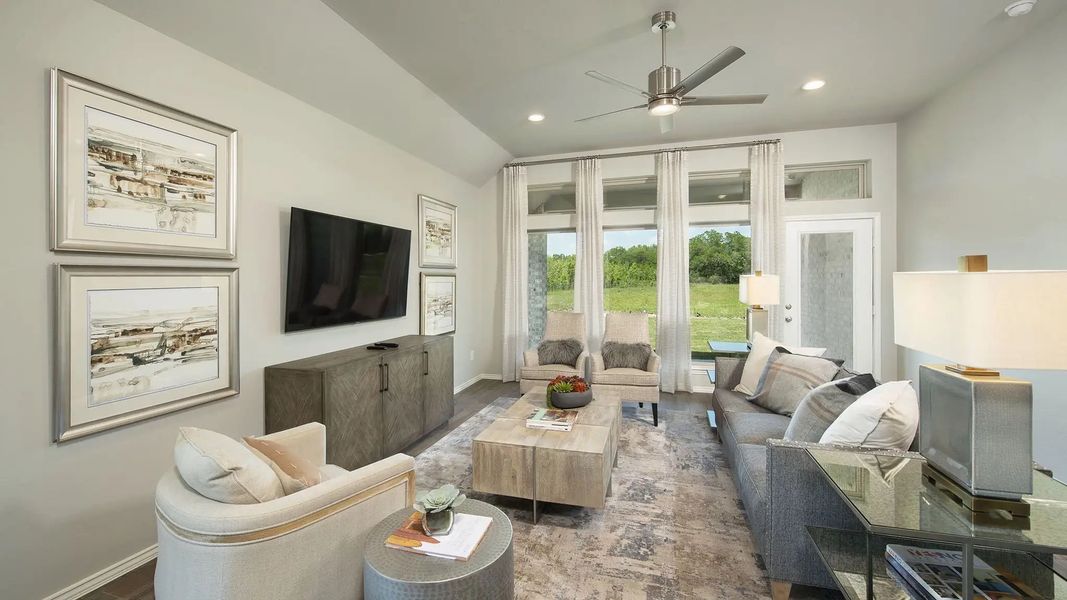 Furnished interior in a model home at Lakes Of Cane Island 45' in Katy (Image 24).