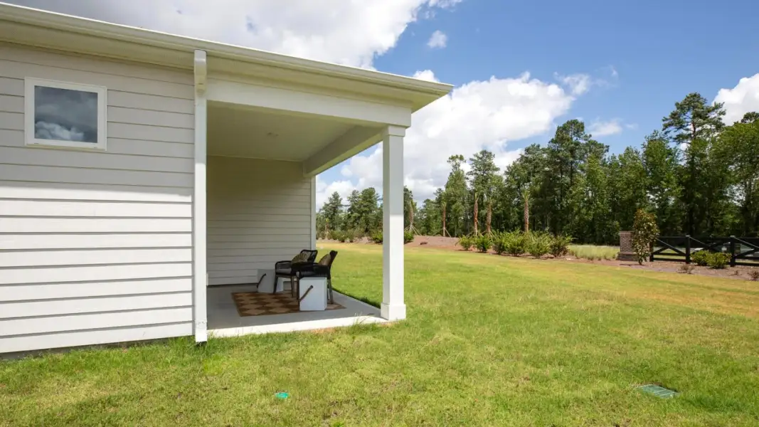 Exterior details of a home in The Retreat at Indigo Preserve Townhomes, Leland (Image 7).
