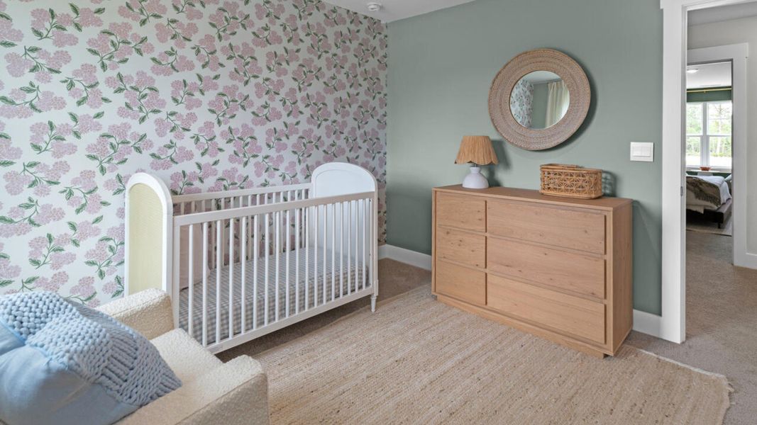 Furnished interior in a model home at Eagle Creek in Bolivia (Image 32).