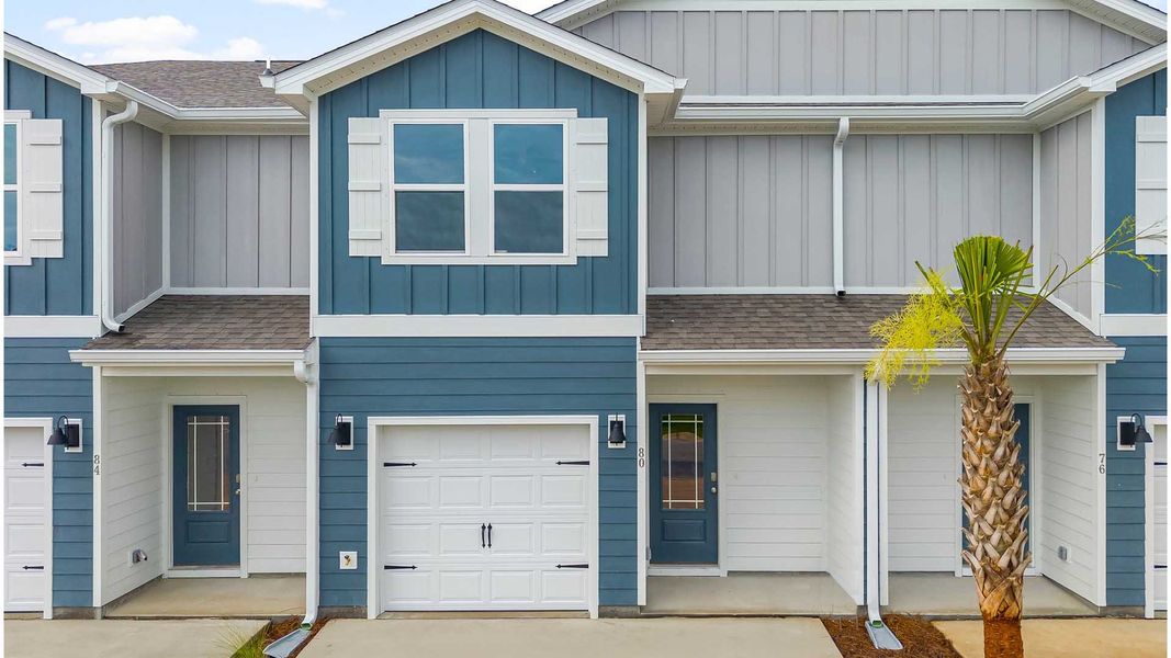 Front exterior of a home in the Hawks Landing Townhomes community, located in Santa Rosa Beach, FL (Image 3).