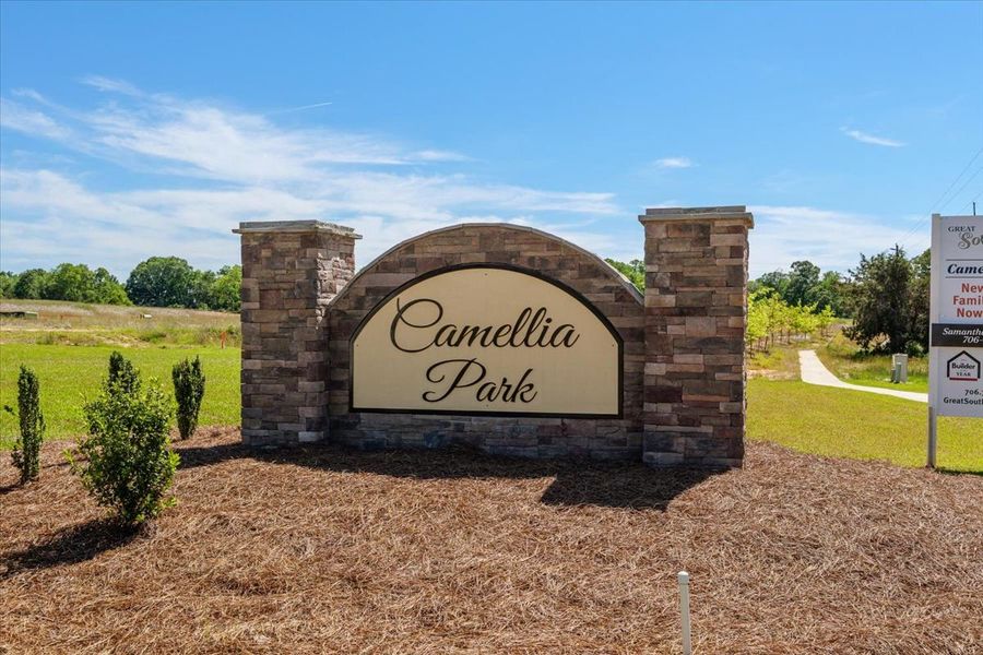 Entrance to the Essence at Camellia Park community in Thomson, GA, featuring signage and landscaping (Image 2). Entrance to the Essence at Camellia Park community in Thomson, GA, featuring signage and landscaping (Image 2).