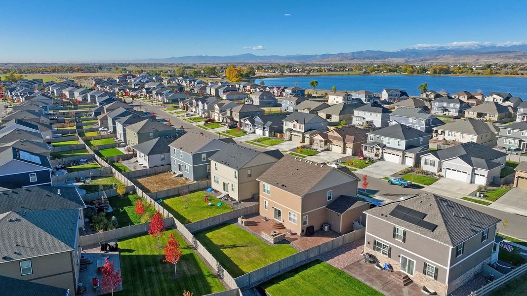 Aerial view of the Villas at Vantage community in Berthoud, CO, showing layout and nearby surroundings (Image 1). Aerial view of the Villas at Vantage community in Berthoud, CO, showing layout and nearby surroundings (Image 1).