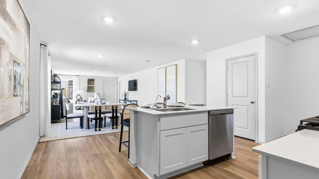 Furnished interior in a model home at Watermark in Alvin (Image 9).