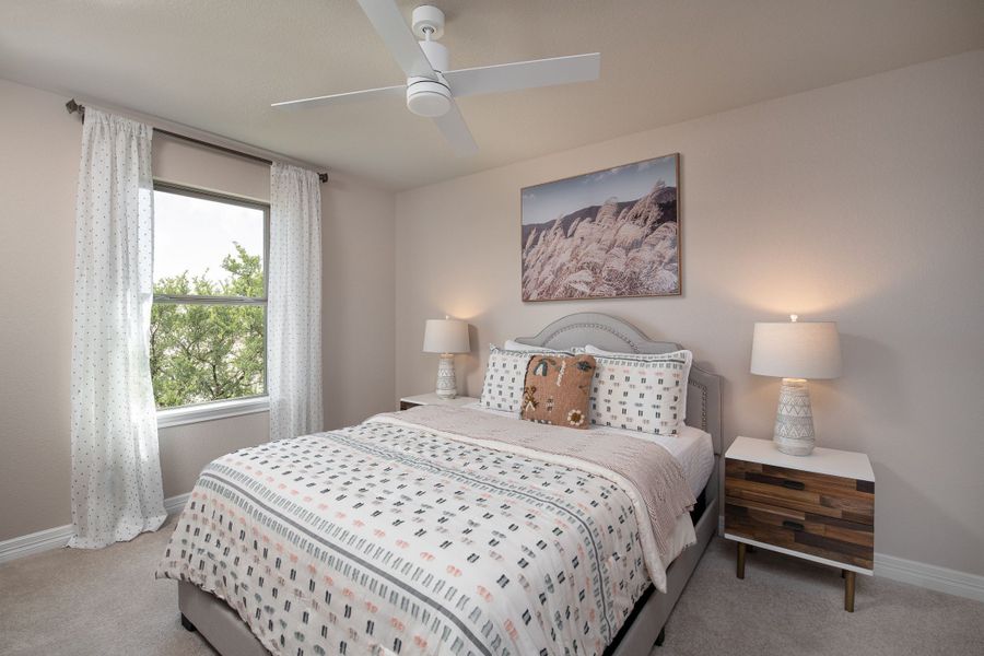 Furnished interior in a model home at Sunterra 50ft in Katy (Image 8).