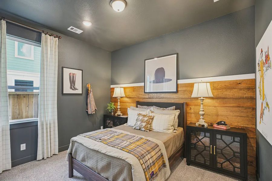 Furnished interior in a model home at Meridiana 50's in Manvel (Image 13).