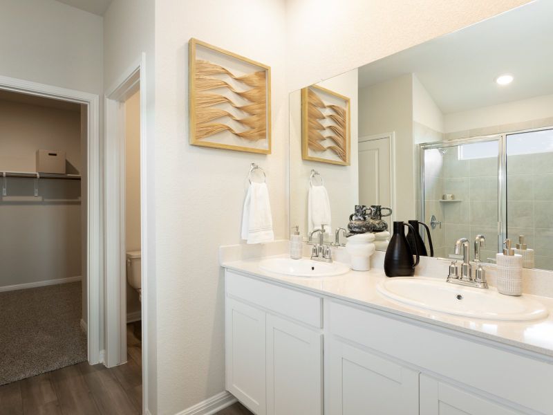 Plenty of counter space in this luxurious primary bathroom.