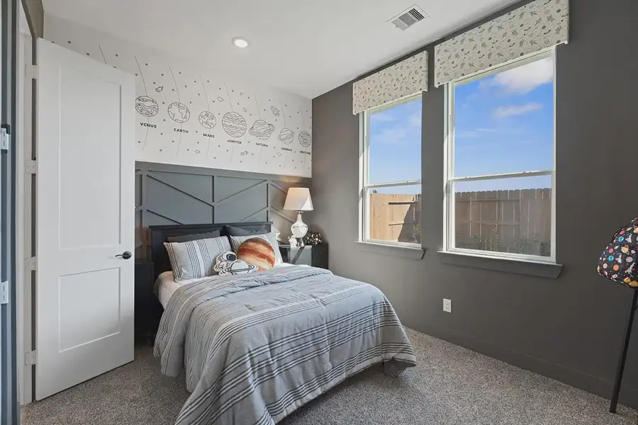 Furnished interior in a model home at Brookewater 60's in Rosenberg (Image 30).