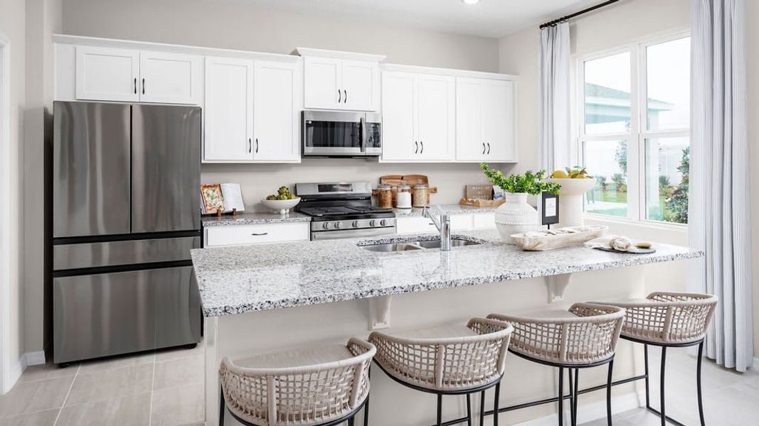 Furnished interior in a model home at Hodges Reserve in Howey-in-the-Hills (Image 5).