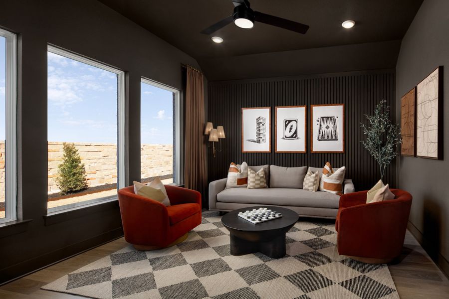 Furnished interior in a model home at Parmer Ranch in Georgetown (Image 27).