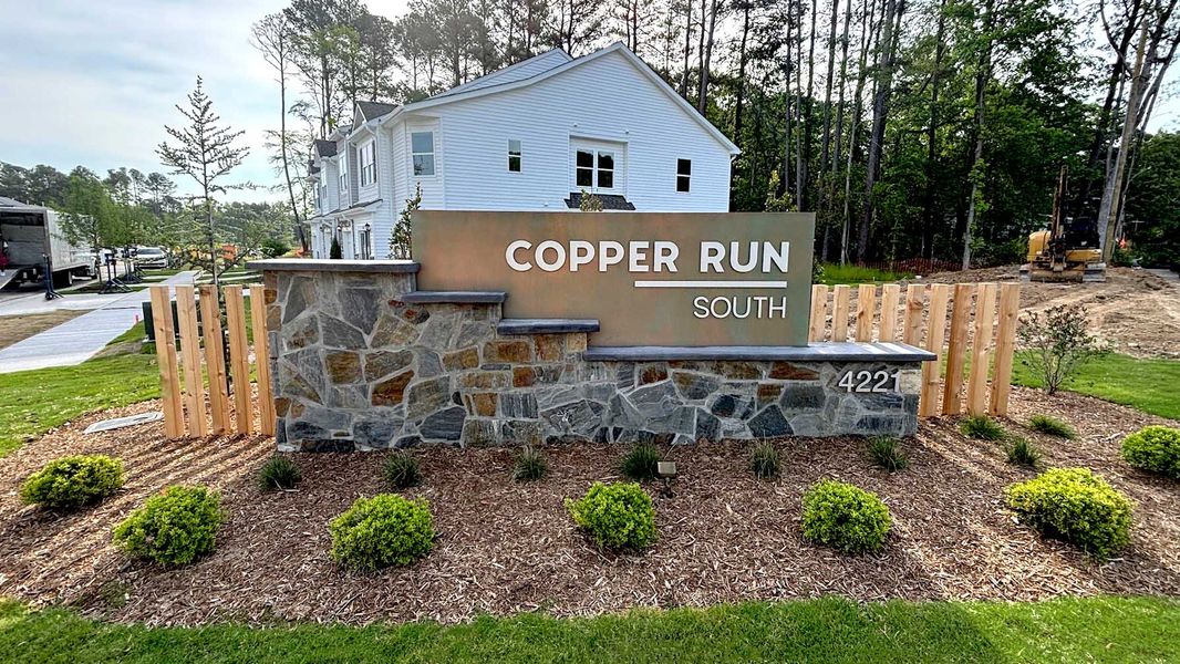 Entrance to the Copper Run South community in Durham, NC, featuring signage and landscaping (Image 2). Entrance to the Copper Run South community in Durham, NC, featuring signage and landscaping (Image 2).