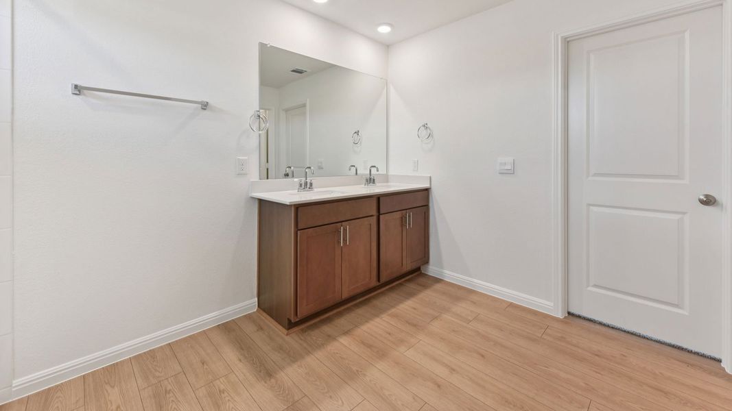 Furnished interior in a model home at Carillon in Manor (Image 43).