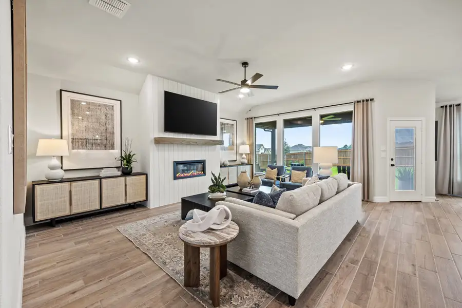 Furnished interior in a model home at Mockingbird Hills - Signature Series in Joshua (Image 6).