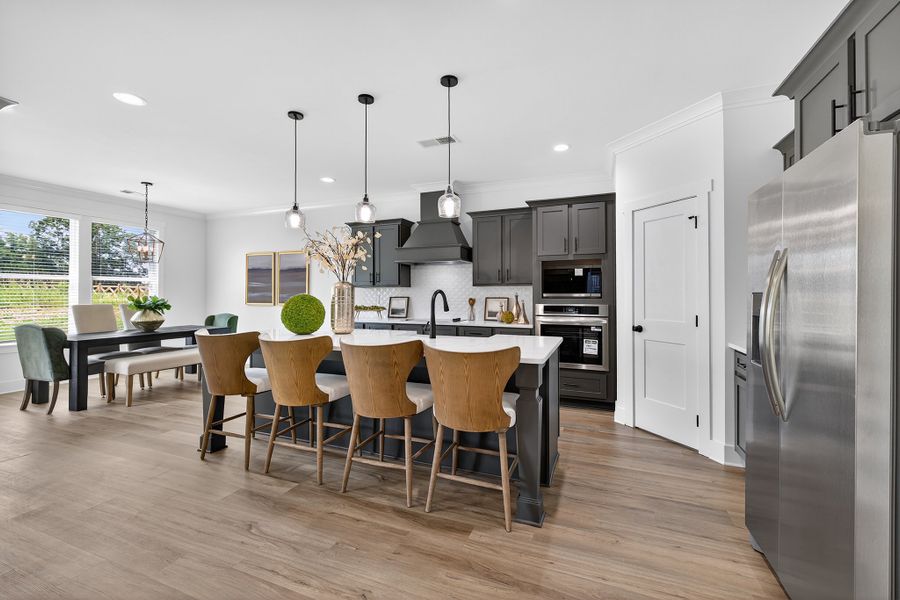 Furnished interior in a model home at Cotton Creek in Good Hope (Image 4).