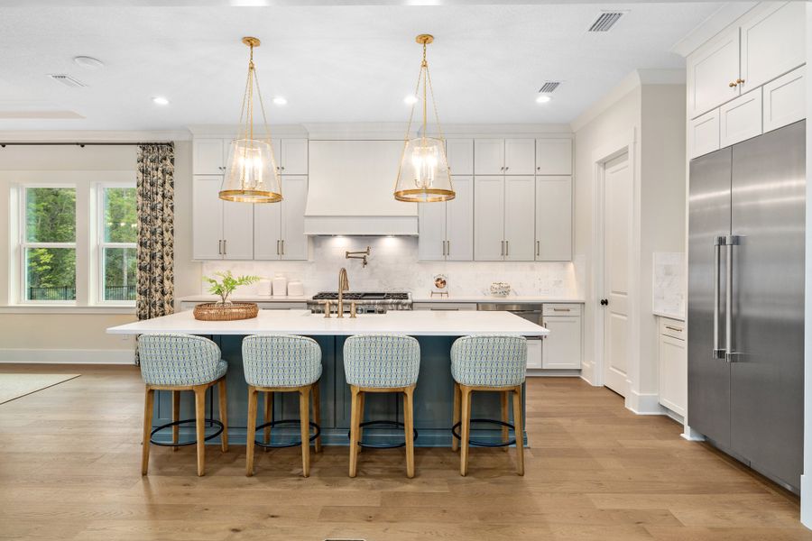 Furnished interior in a model home at Hidden Creek at SilverLeaf 80' Gold Series in St. Augustine (Image 50).