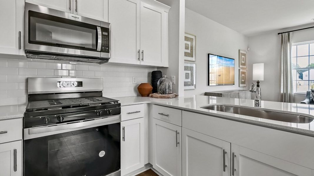 Furnished interior in a model home at The Townes at Prestleigh in Wake Forest (Image 9).
