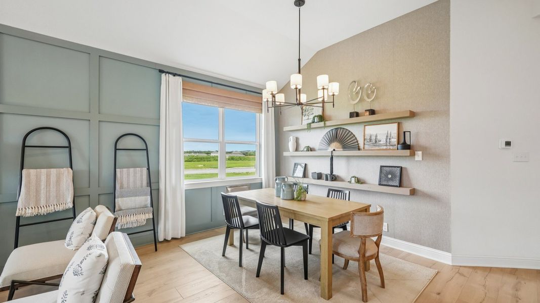 Open and airy great room seamlessly flowing into the dining area and kitchen with abundant natural light Open and airy great room seamlessly flowing into the dining area and kitchen with abundant natural light