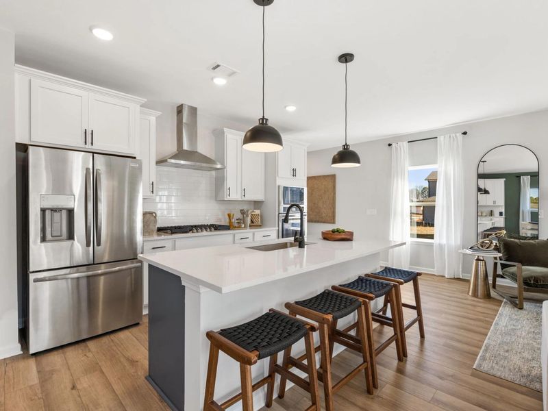Furnished interior in a model home at The Bluffs in Canton (Image 5).
