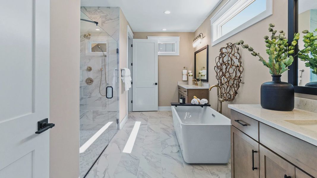 Furnished interior in a model home at The Courtyards on the Greenway in Matthews (Image 14).