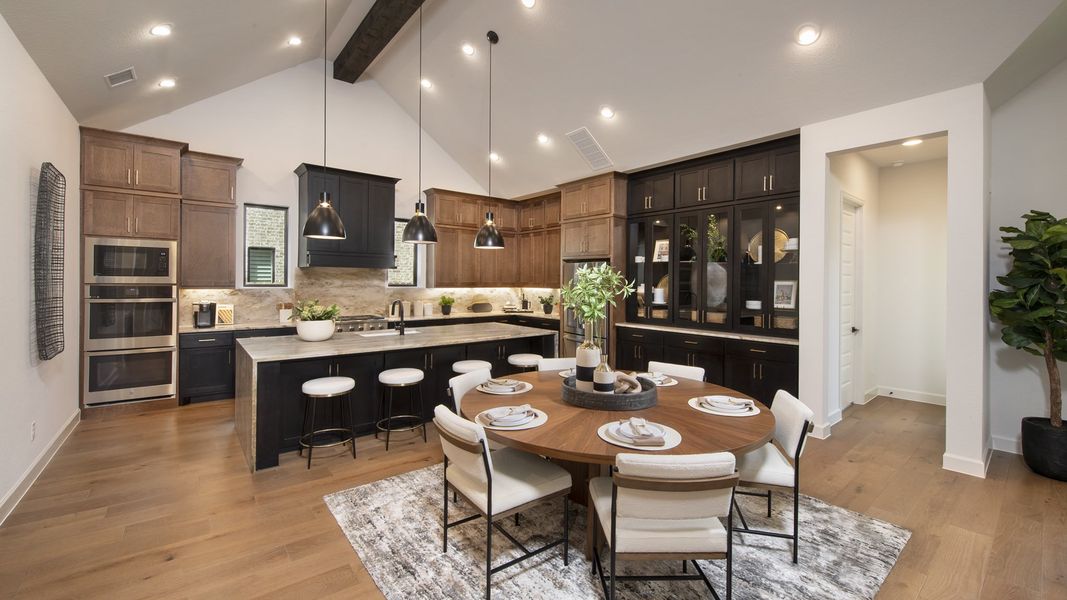 Furnished interior in a model home at Riceland 70' in Mont Belvieu (Image 11).