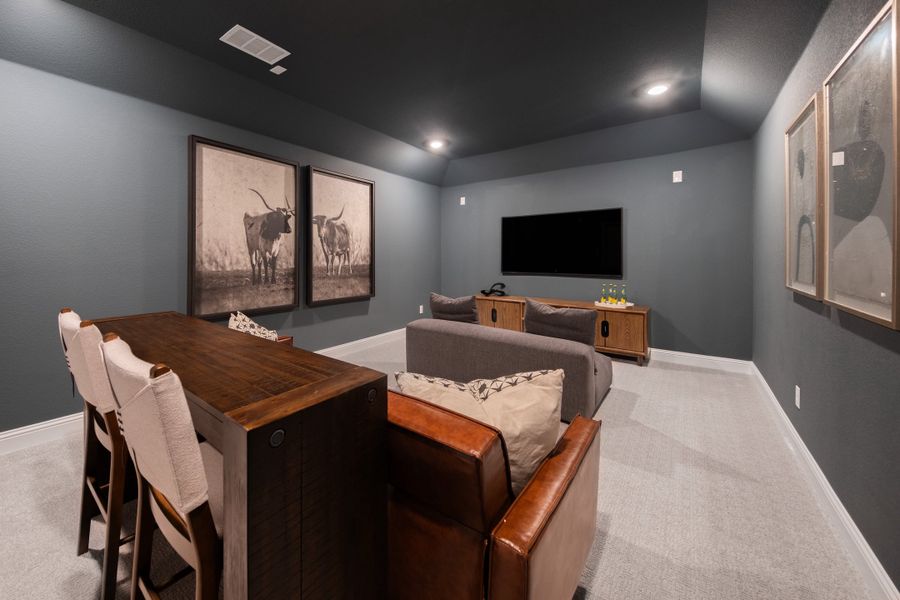 Furnished interior in a model home at Verandah: Meadows 50' in Royse City (Image 12).