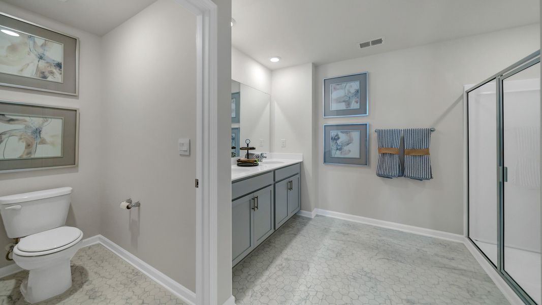 Furnished interior in a model home at South Haven in Camden (Image 9).