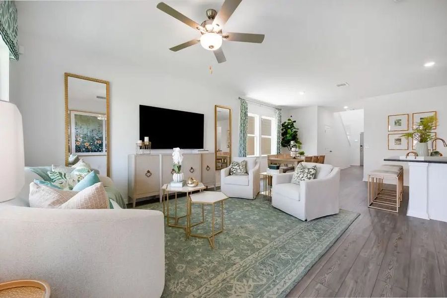 Furnished interior in a model home at Village Grove in Dripping Springs (Image 18).