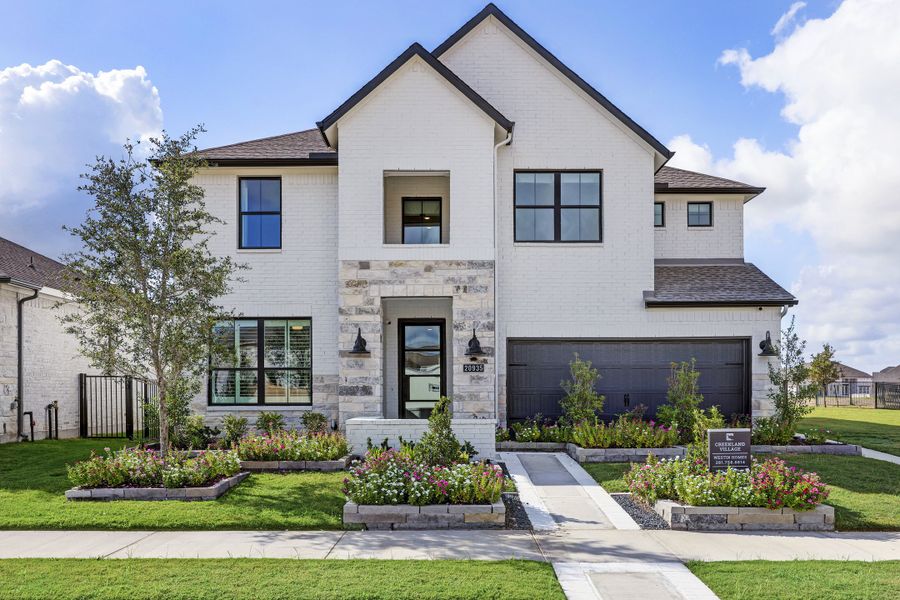 Front exterior of a home in the Bridgeland 50' (Creekland Village) community, located in Cypress, TX (Image 1). Front exterior of a home in the Bridgeland 50' (Creekland Village) community, located in Cypress, TX (Image 1).