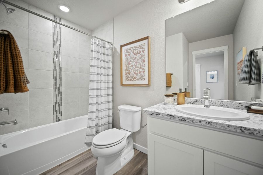 Furnished interior in a model home at Aspen Meadows – Townhomes in Colorado Springs (Image 16). Furnished interior in a model home at Aspen Meadows – Townhomes in Colorado Springs (Image 16).