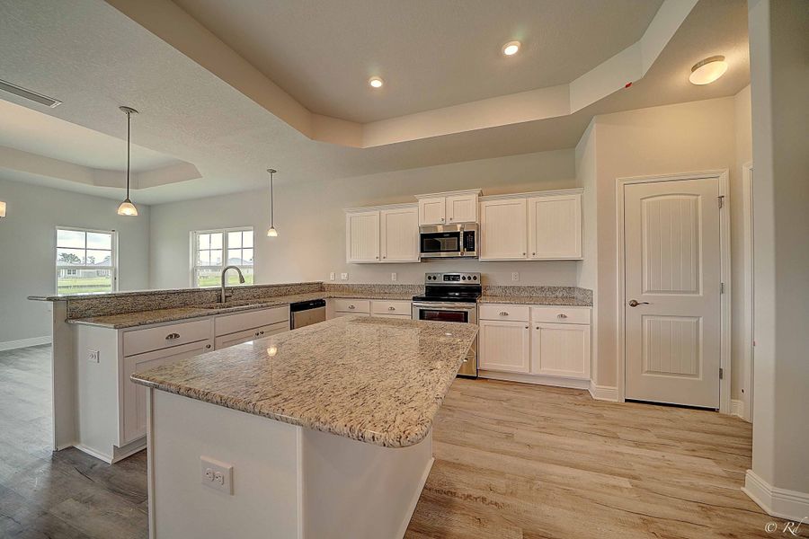 Furnished interior in a model home at Cedar Creek at Deerpoint Lake in Panama City (Image 6).
