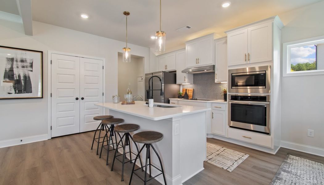 Furnished interior in a model home at Kentmere in Auburn (Image 32).