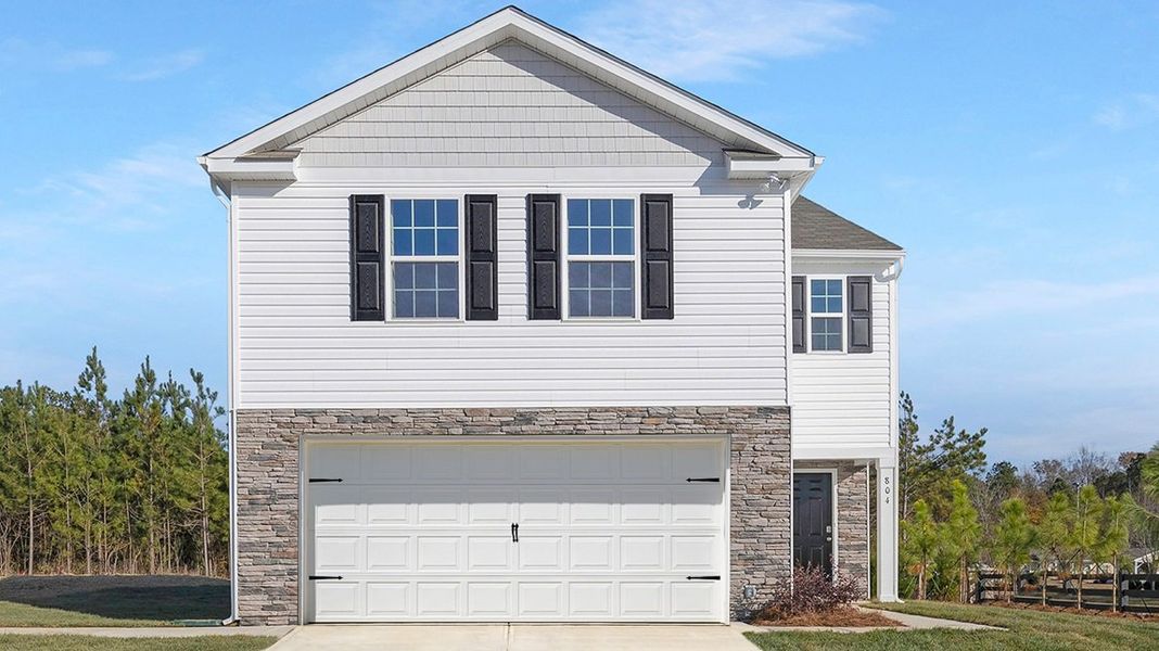 Front exterior of a home in the Woodhaven at Chester community, located in Chester, SC (Image 2). Front exterior of a home in the Woodhaven at Chester community, located in Chester, SC (Image 2).