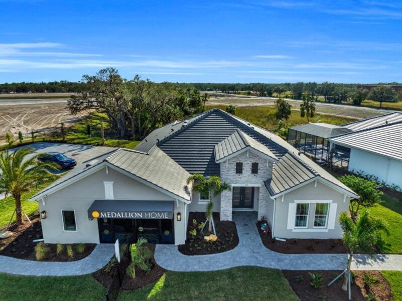 Front exterior of a home in the River Preserve Estates community, located in Parrish, FL (Image 2). Front exterior of a home in the River Preserve Estates community, located in Parrish, FL (Image 2).