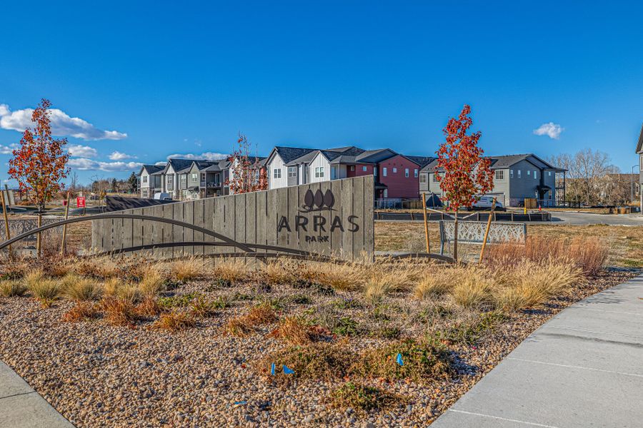 Entrance to the Arras Park community in Thornton, CO, featuring signage and landscaping (Image 2).
