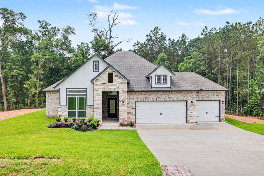 Front exterior of a home in the Rose Hill Estates community, located in Willis, TX (Image 2). Front exterior of a home in the Rose Hill Estates community, located in Willis, TX (Image 2).